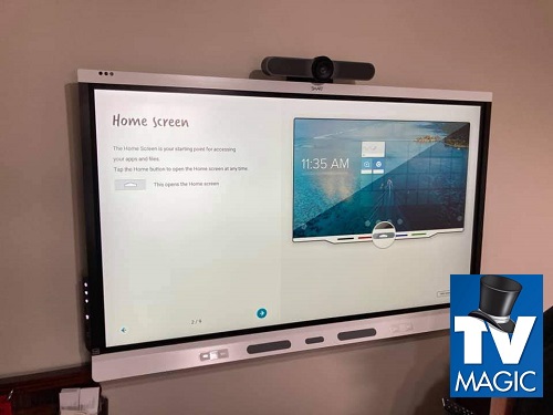 a large smart board with a TV Magic logo in the bottom right corner