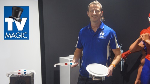 technician in a partially completed home cinema. With life-size custom designed movie characters