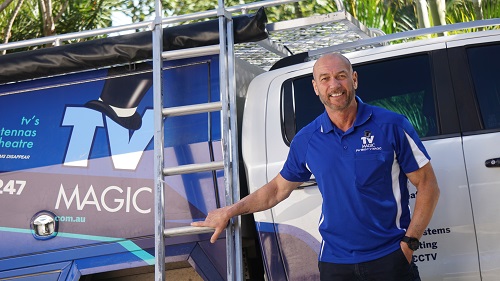 Technician - Darren with his ladder, next to his vehicle