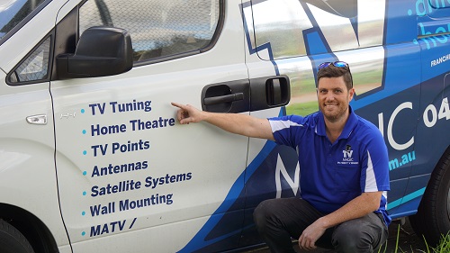 Technician pointing at his tuning service.