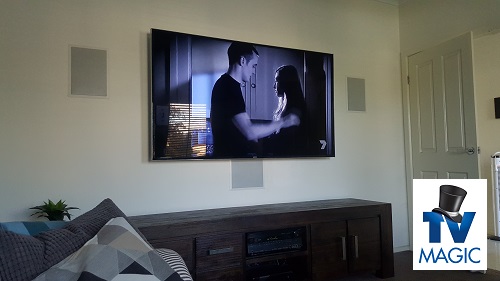 complete home theatre setup with in-wall speakers