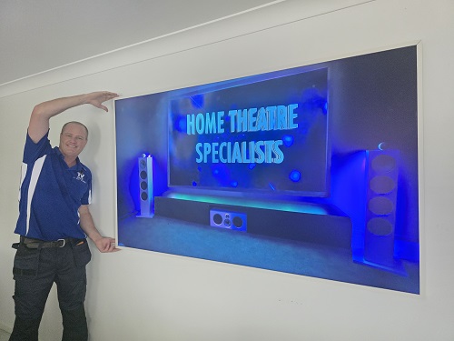 Big screen with technician