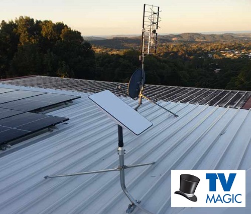 a Starlink dish on a tin roof. 
