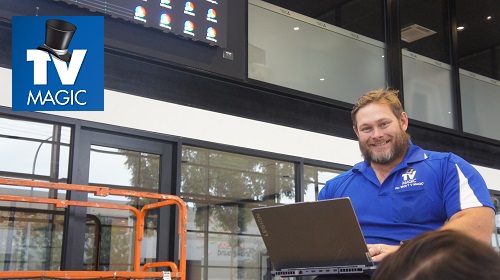 Technician at a commercial property attending to an insurance repair assessment