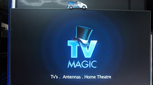 Large screen with TV Magic logo