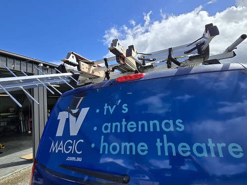 Antenna in front of TV Magic van