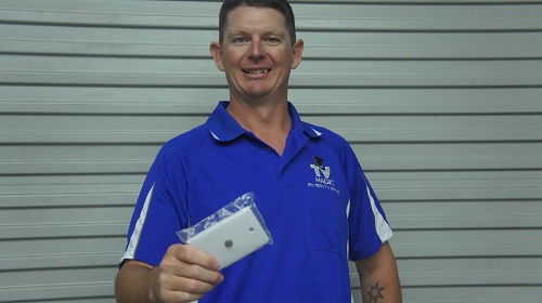 Technician - Brendan, holding a TV point