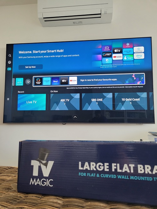 Large wall mounted TV installed by TV Magic. TV Magic wall mounting bracket below