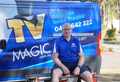 technician - Carl sitting beside his van