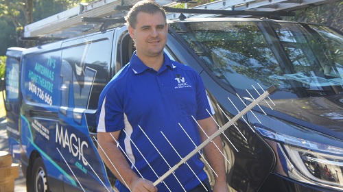 Technician holding an aerial