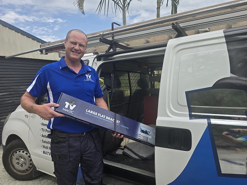 Technician with a TV Magic TV wall mounting bracket