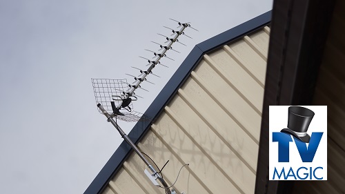 an antenna on a tin roof with a TV Magic logo in bottom right corner