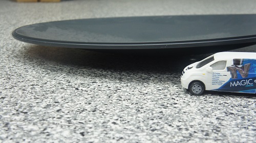 Satellite dish with a mini TV Magic van