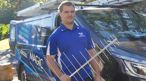 Technician holding an antenna