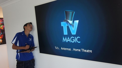 Technician with his laptop, performing a damage report