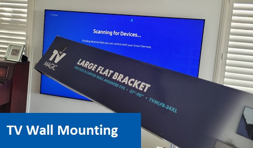 a large TV, with a TV Magic wall mounting bracket in front of it. Caption "TV Wall Mounting" in bottom left corner