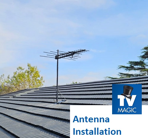 close up of an antenna installation on a tile roof. Caption "Antenna Installation" and TV Magic logo in bottom right corner