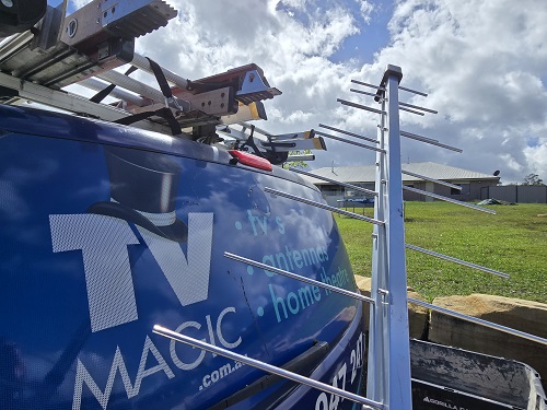 Antenna behind TV Magic van