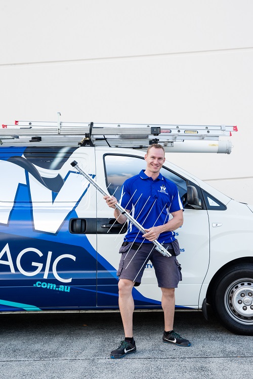 Technician Paul, holding an antenna