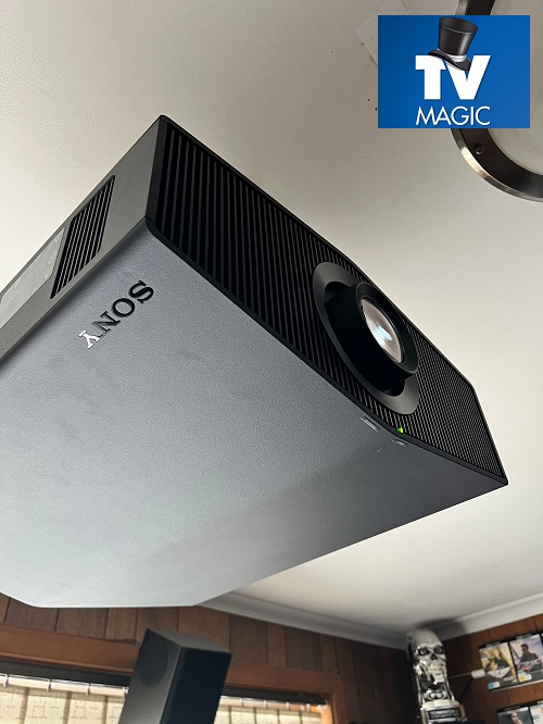 Close up of a ceiling mounted projector.