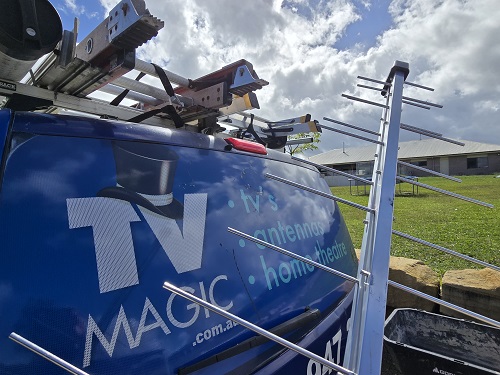 TV Magic van with an antenna in front of it.