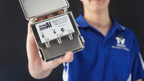 Technician holding a booster