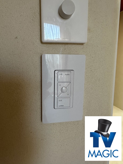 close up of multi-room audio control panel. TV Magic logo in bottom right corner