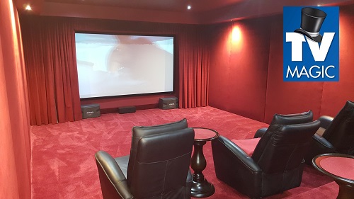 a luxurious home cinema with a TV Magic logo in top right corner