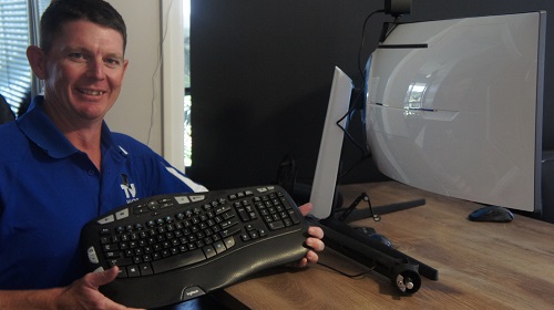 Technician with a computer setup