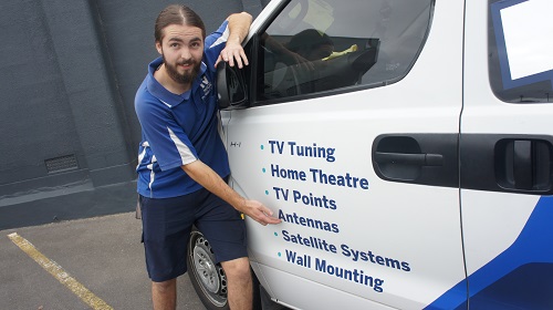Technician pointing at his antenna services