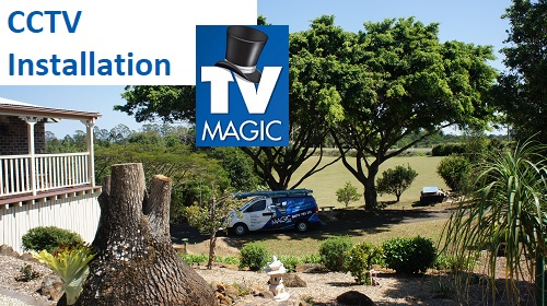 TV magic van in the distance under trees, with caption "CCTV Installation" at top of screen with TV Magic logo