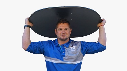 Technician wearing a satellite dish as a hat