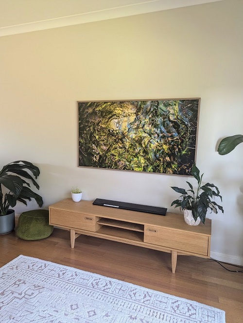 s stylishly wall mounted TV in a living room