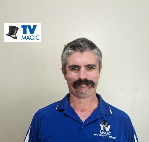 Adrian - local technician, with TV Magic logo in top left corner