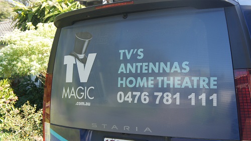 The back of a TV Magic van with Brent's phone number on it