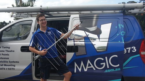 Technician - Keith, holding an antenna