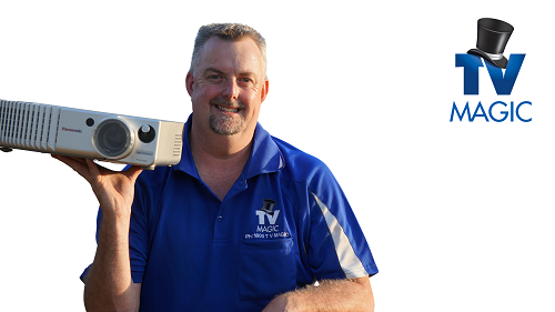 Technician holding a projector. Logo in right upper corner