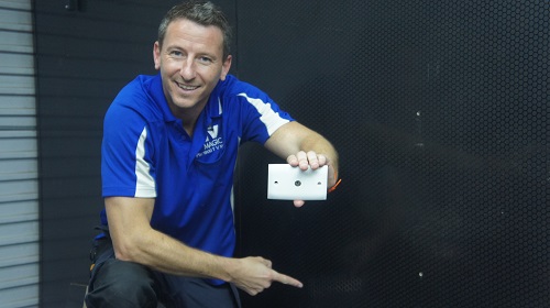 Jim holding a new TV point ready for installation