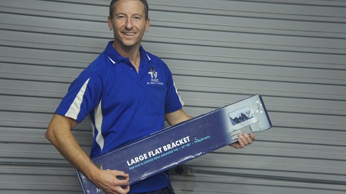 Jim holding a TV Magic branded TV wall bracket