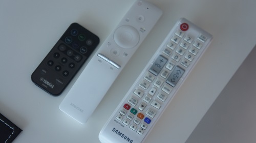 3 remotes on a coffee table