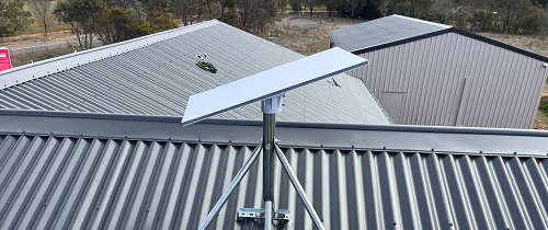 A Starlink installation on a tin roof