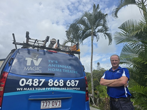 Technician Ben, standing at the rear of his van.