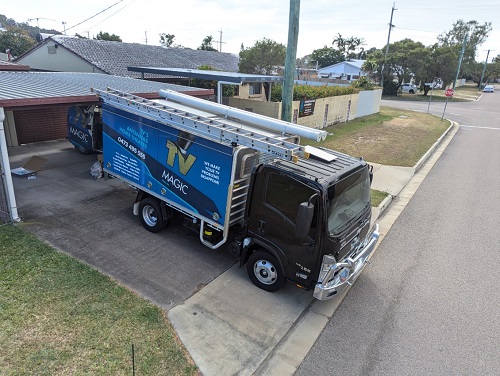 Gordon's mini TV Magic truck in a Hermit Park driveway.