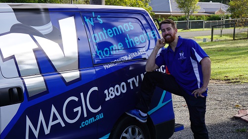 Technician - Gordon, leaning on his van