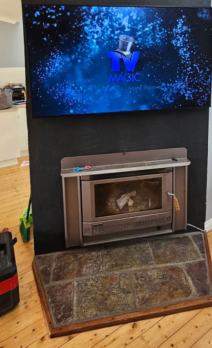 Above fireplace arm bracket 2025