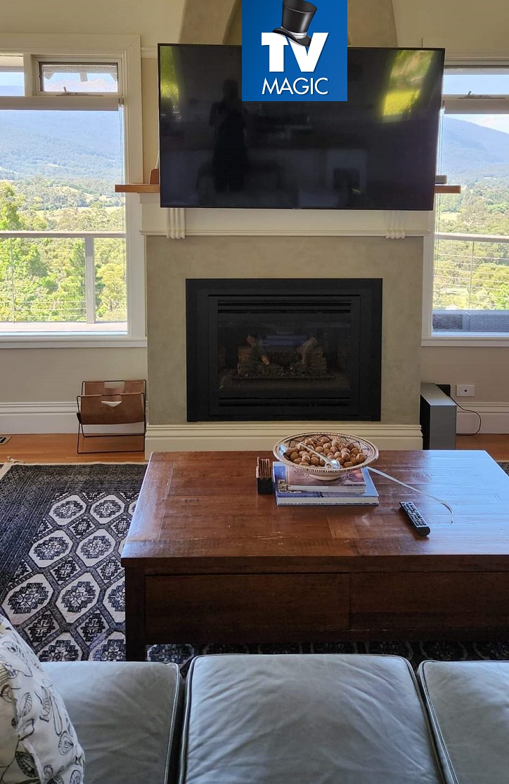 above fireplace mounted tv amazing view 2024