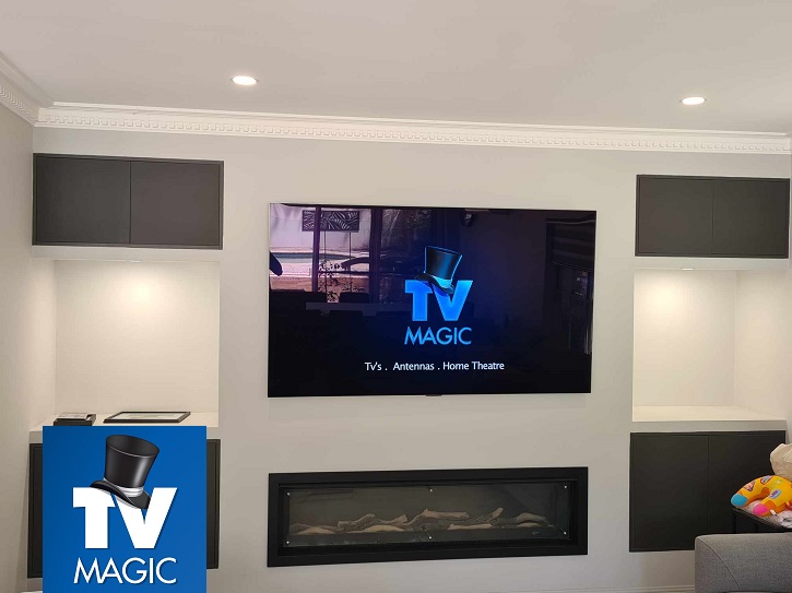 very nice TV mounted above a fireplace 2025